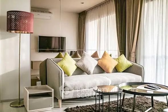 Stylish modern living room with cozy sofa and elegant decor