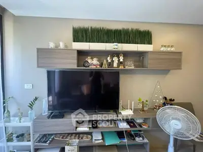 Modern living room with stylish TV unit and decorative shelves