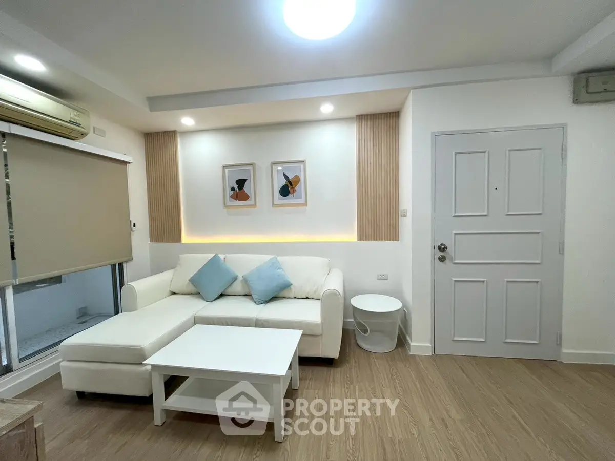 Modern living room with stylish decor and cozy seating area