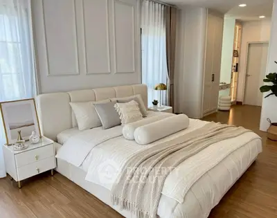 Luxurious bedroom with elegant decor and cozy ambiance