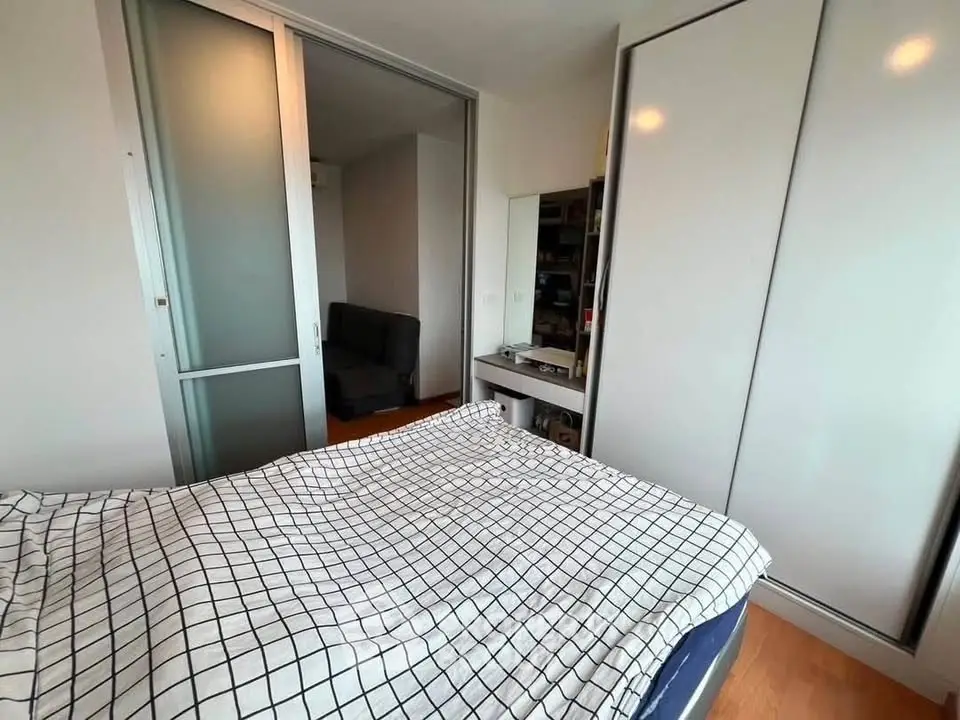 Modern bedroom with sliding closet doors and stylish decor