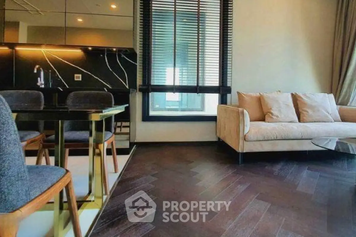 Modern living room with elegant parquet flooring and stylish furniture
