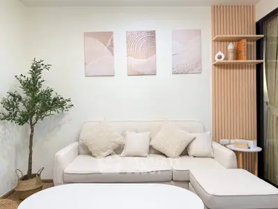 Modern living room with elegant decor and cozy seating area