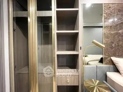 Modern bedroom with built-in wooden shelves and elegant lighting