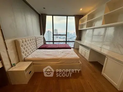 Luxurious bedroom with stunning city view and elegant built-in shelves