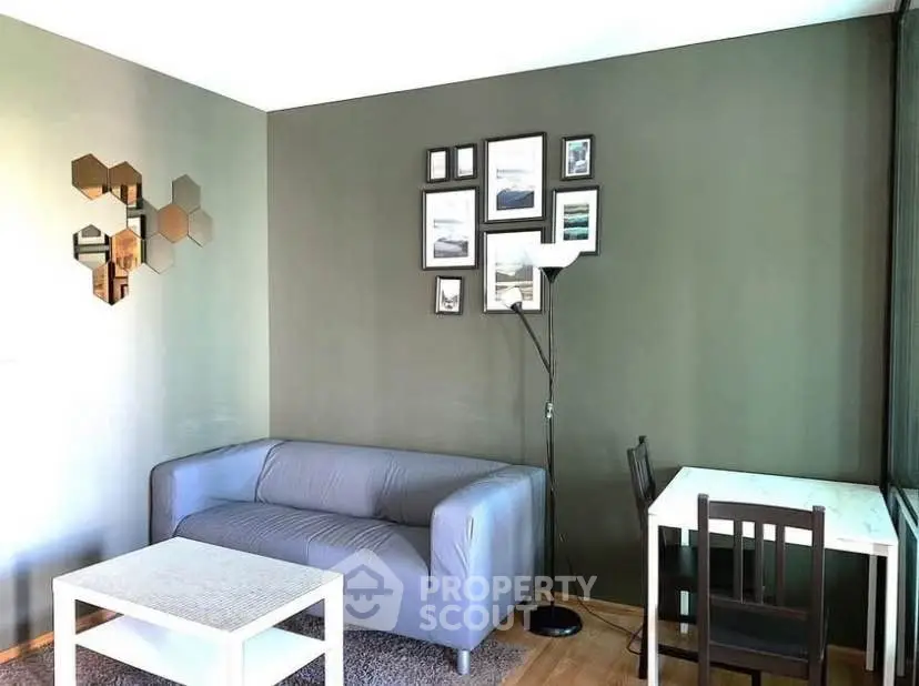 Modern living room with stylish decor and cozy seating area, perfect for relaxation and entertaining.