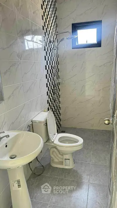 Modern bathroom with stylish tiles and sleek fixtures