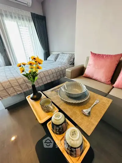 Cozy studio apartment with modern decor and natural light