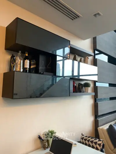 Modern living room with sleek wall-mounted shelves and stylish decor