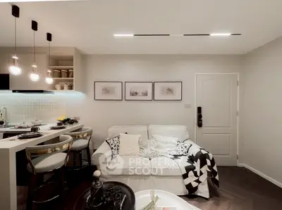 Cozy modern living room with stylish decor and open kitchen layout
