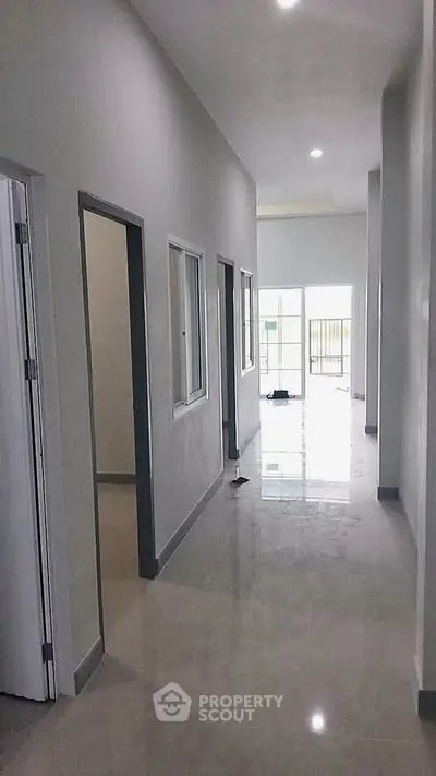 Spacious hallway with modern design and natural light