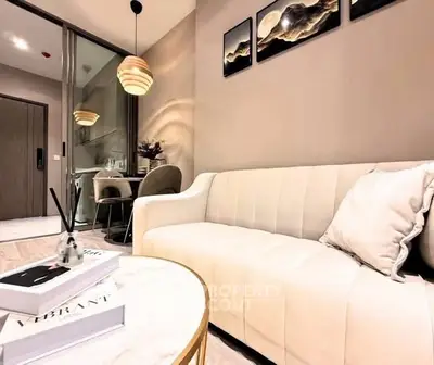 Modern living room with elegant decor and cozy seating area