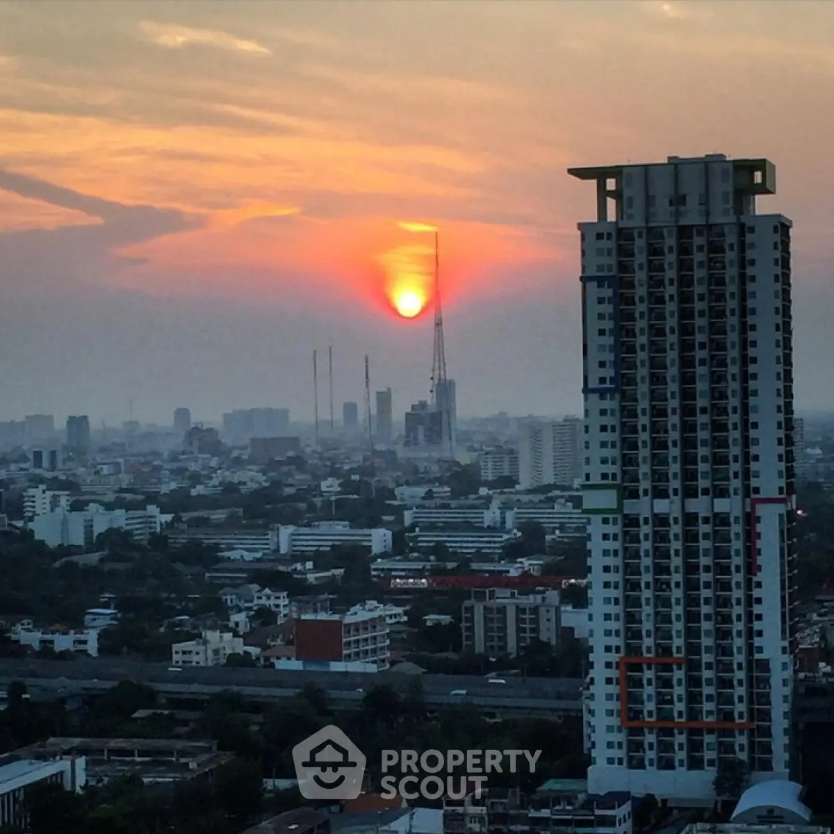 Stunning cityscape view with high-rise building at sunset, perfect for urban living enthusiasts.