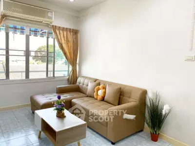 Cozy living room with modern sofa and natural light