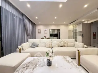 Luxurious modern living room with elegant decor and spacious seating area