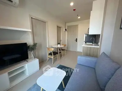 Modern living room with cozy seating and compact dining area