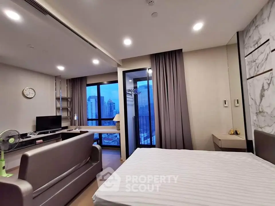 Modern studio apartment with city view and stylish interior design