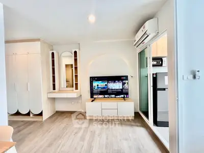 Modern living room with built-in storage and sleek TV setup