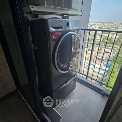 Modern washing machine on a high-rise balcony with city view, perfect for urban living convenience.
