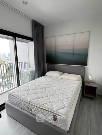 Modern bedroom with balcony view in urban apartment
