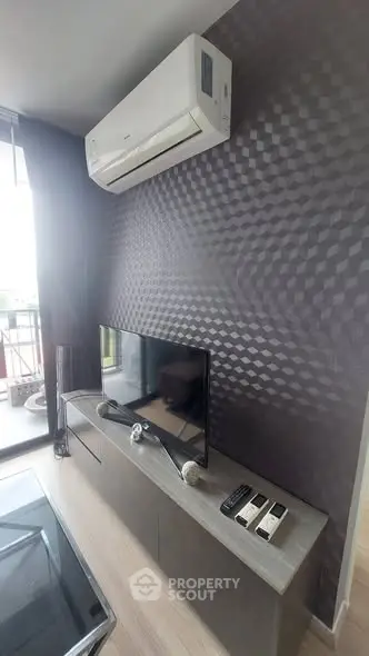 Modern living room with air conditioning and stylish decor