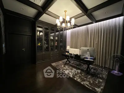 Luxurious home office with elegant dark wood decor and modern lighting