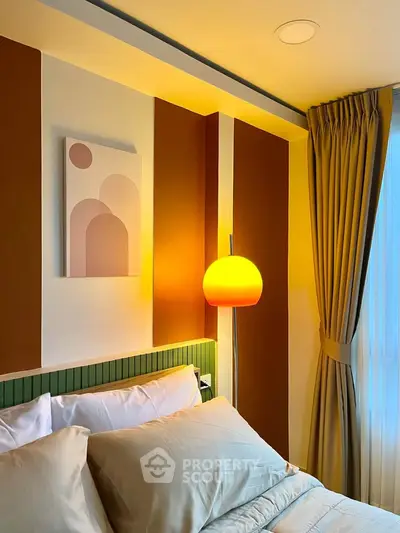 Cozy bedroom with modern decor and warm lighting