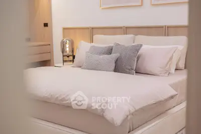 Luxurious bedroom with plush bedding and elegant decor
