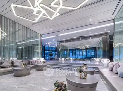 Luxurious modern living room with elegant lighting and mirrored walls