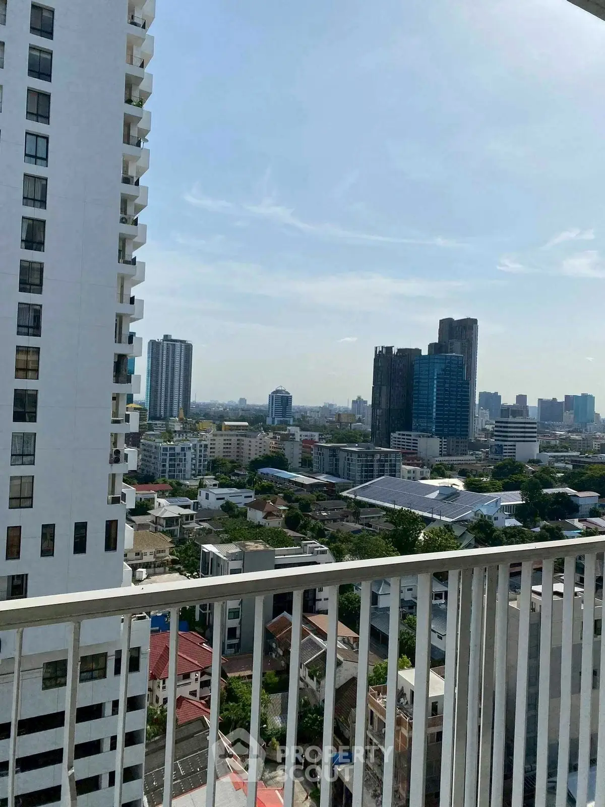 Stunning cityscape view from a high-rise balcony, perfect for urban living enthusiasts.