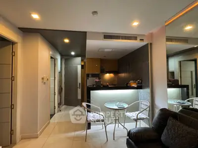 Modern living room with open kitchen and stylish furniture