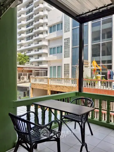 Charming balcony with city view, perfect for relaxing and enjoying urban living.