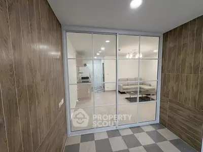 Modern interior with glass partition and stylish living room