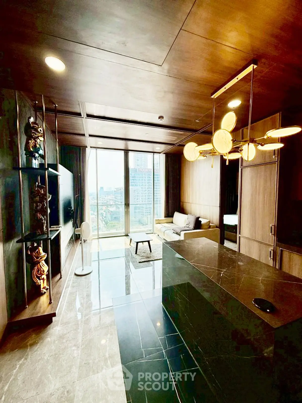 Luxurious modern living room with city view, elegant lighting, and sleek marble flooring.