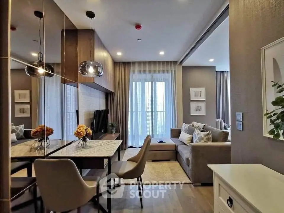 Modern living room with elegant dining area and stylish decor