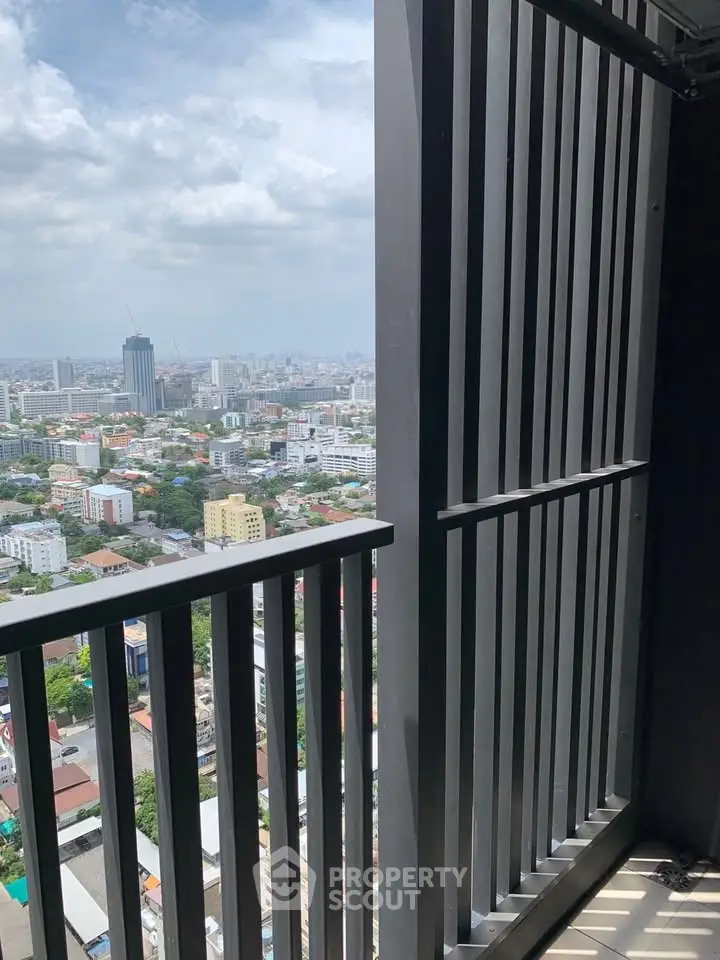 Stunning cityscape view from a high-rise balcony, perfect for urban living enthusiasts.