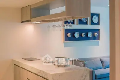 Modern kitchen with marble countertop and stylish decor