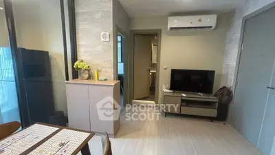 Modern living room with air conditioning and stylish decor in a cozy apartment.