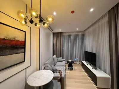 Modern living room with stylish lighting, cozy sofa, and sleek TV setup, perfect for relaxation and entertainment.