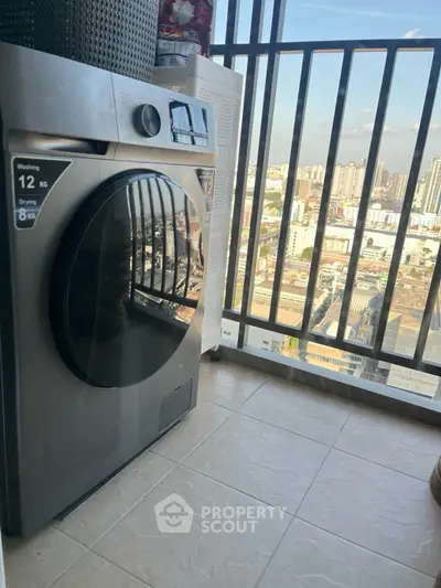 Modern washing machine on balcony with city view, perfect for urban living convenience.
