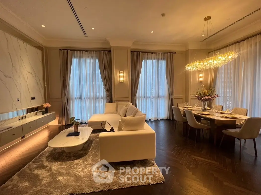 Luxurious living room with elegant dining area and modern lighting