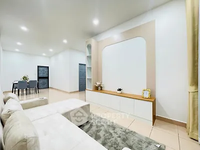 Spacious modern living room with elegant decor and dining area