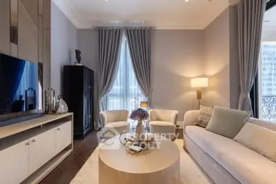Elegant living room with modern decor and large window, perfect for relaxation and entertainment.