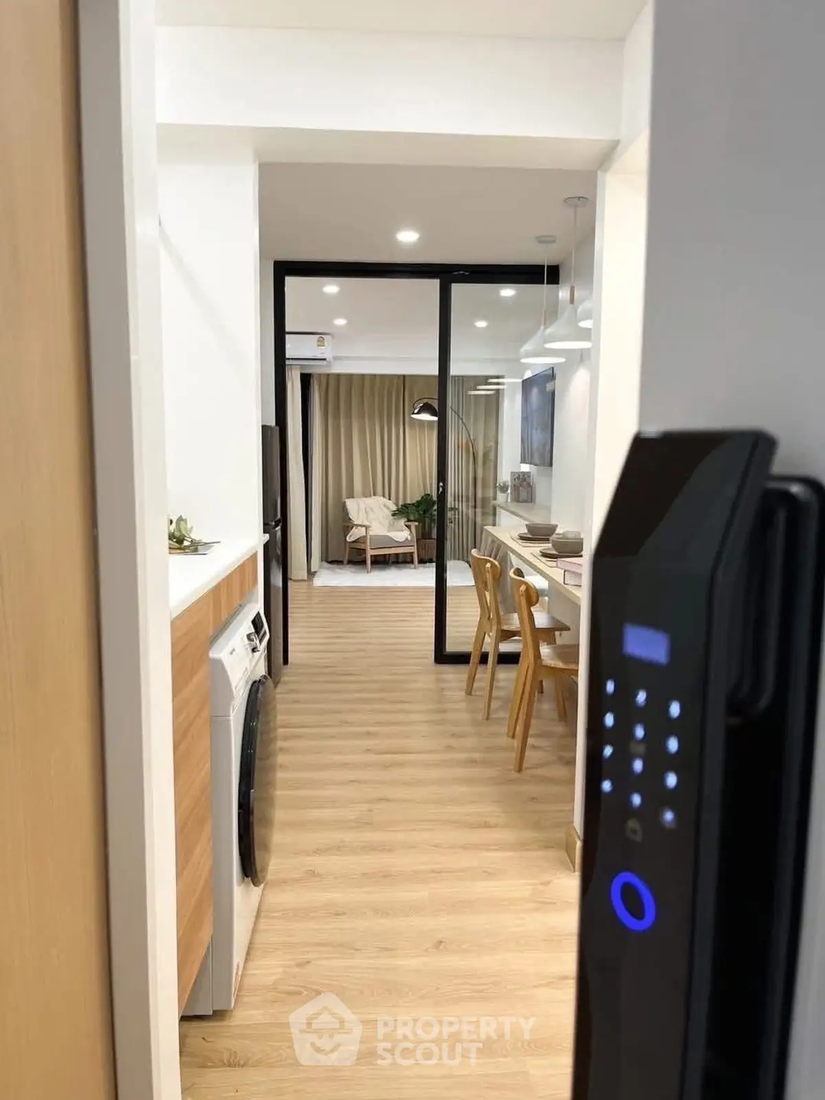 Modern apartment with smart lock, open kitchen, and cozy living area