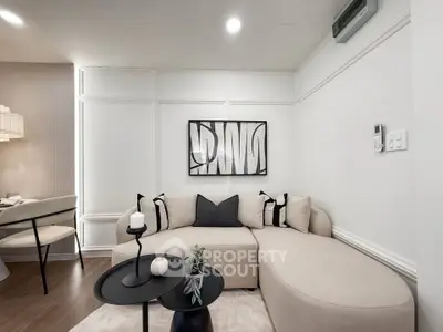 Stylish modern living room with elegant decor and cozy seating area