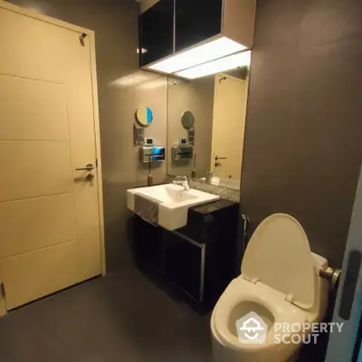 Modern bathroom with sleek fixtures and contemporary design.