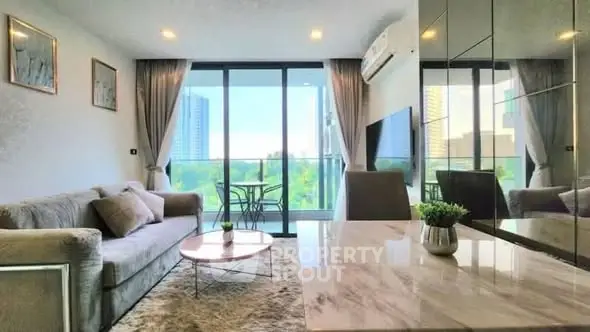 Modern living room with balcony view and stylish decor