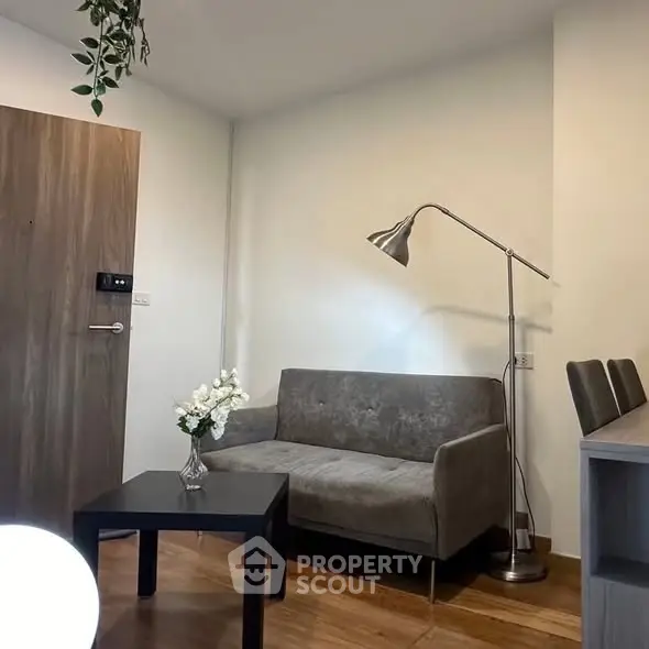 Cozy living room with modern sofa and stylish floor lamp