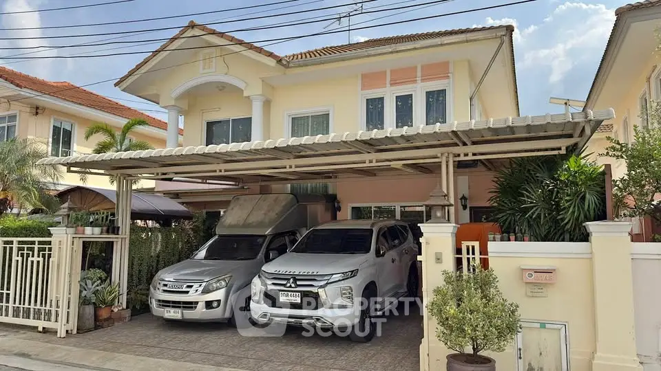 Charming suburban home with spacious carport and lush greenery, perfect for family living.