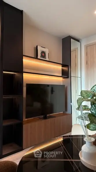 Modern living room with sleek TV unit and stylish decor